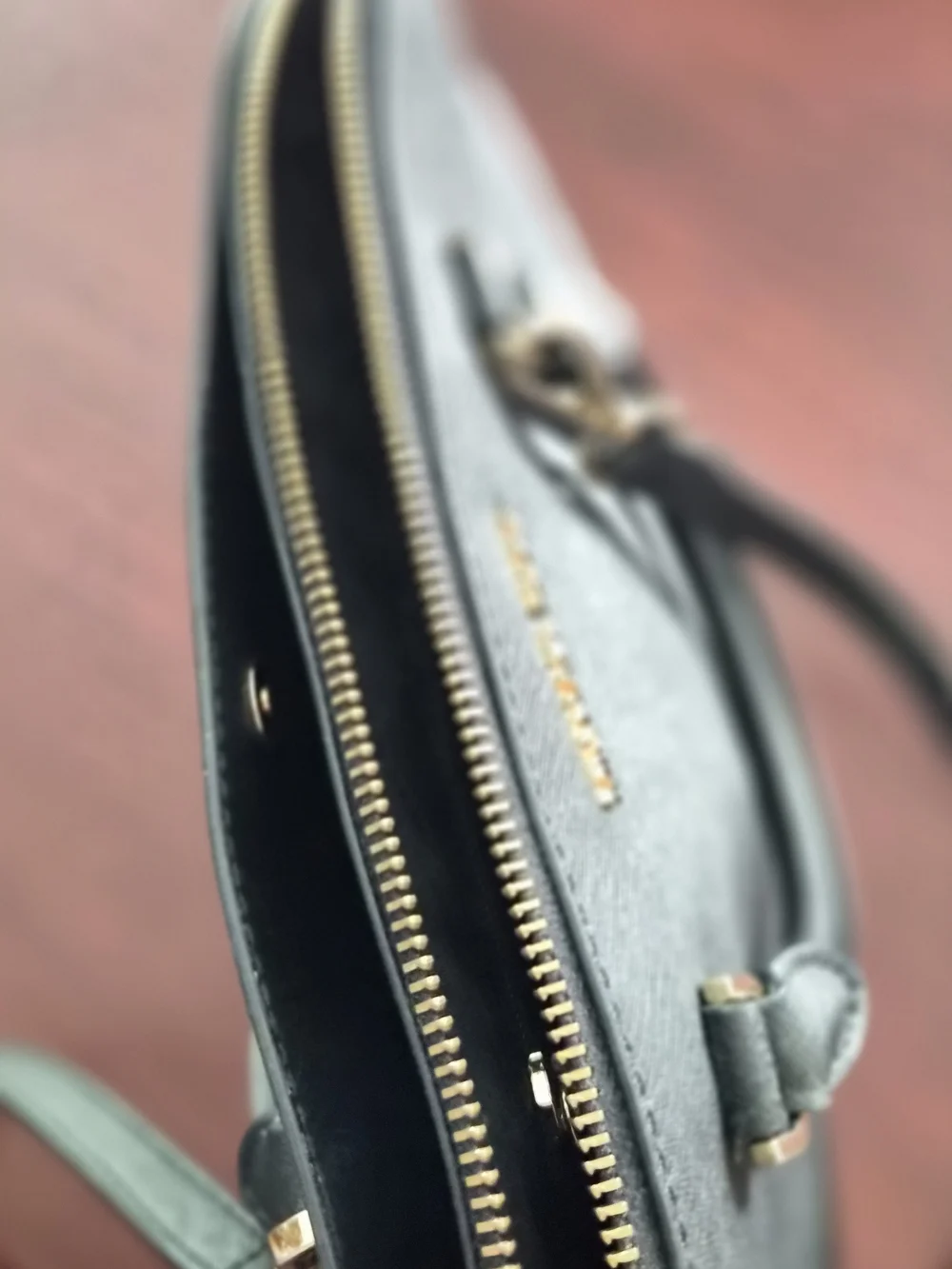Michael Kors Black Saffiano Dome Crossbody Bag with Gold Hardware